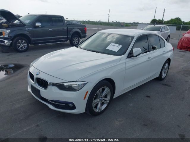 Photo 1 VIN: WBA8B9G51HNU50125 - BMW 330I 