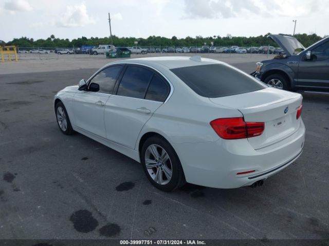 Photo 2 VIN: WBA8B9G51HNU50125 - BMW 330I 