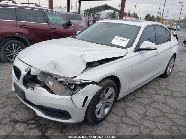 Photo 1 VIN: WBA8B9G55HNU09402 - BMW 330I 