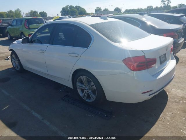 Photo 2 VIN: WBA8B9G57JNU98041 - BMW 330I 