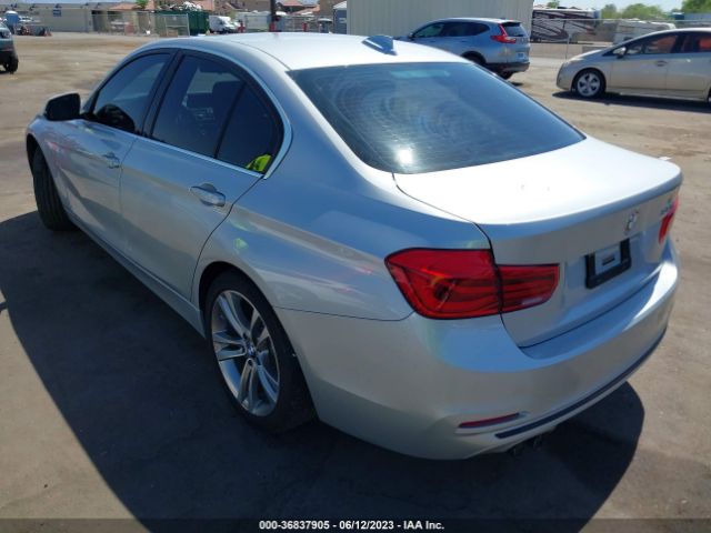 Photo 2 VIN: WBA8B9G57JNU98864 - BMW 330I 