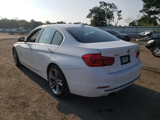 Photo 2 VIN: WBA8D9C55JEM32250 - BMW 330 XI 