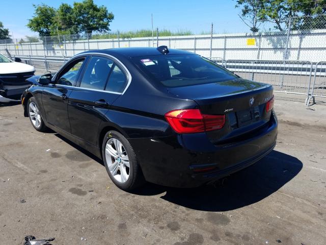 Photo 2 VIN: WBA8D9C57JEM33478 - BMW 330 XI 