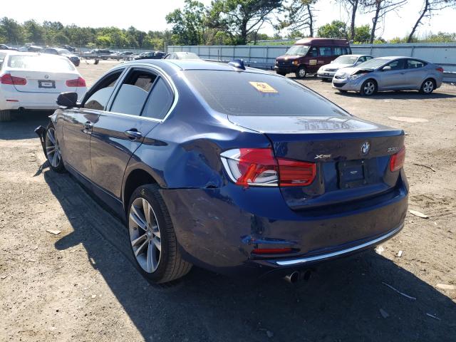 Photo 2 VIN: WBA8D9C5XJA615778 - BMW 330 XI 