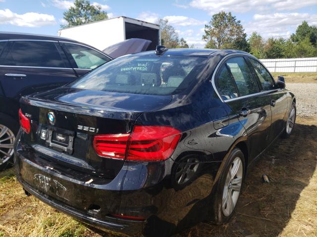 Photo 3 VIN: WBA8D9C5XJEM32213 - BMW 330 XI 