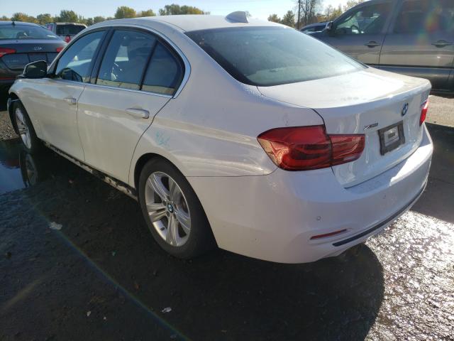 Photo 2 VIN: WBA8D9G33HNU64679 - BMW 330XI 