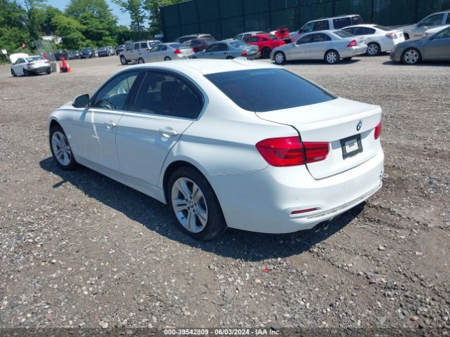 Photo 2 VIN: WBA8D9G50JNU70141 - BMW 330I 