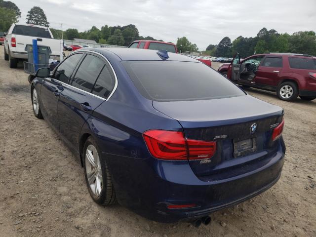 Photo 2 VIN: WBA8D9G55HNU61185 - BMW 330 XI 