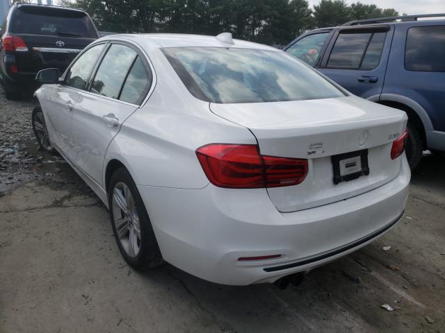 Photo 2 VIN: WBA8D9G5XJNU71197 - BMW 330 XI 