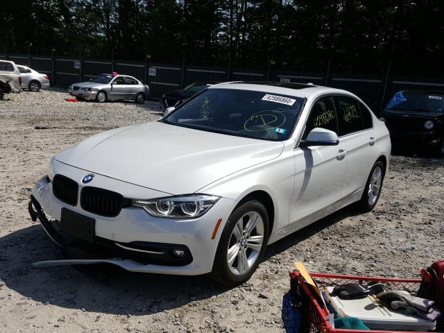 Photo 1 VIN: WBA8D9G5XJNU71541 - BMW 330I 