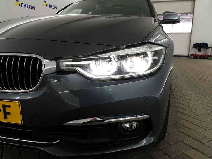 Photo 11 VIN: WBA8E11000K829502 - BMW 3 SERIE SEDAN 