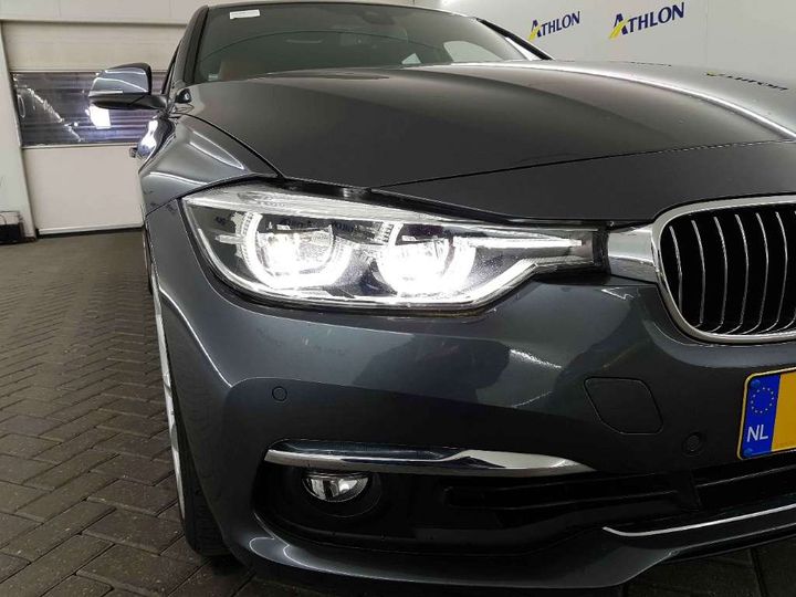 Photo 12 VIN: WBA8E11000K829502 - BMW 3 SERIE SEDAN 