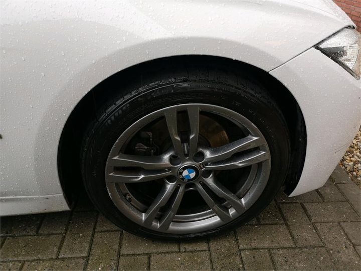 Photo 12 VIN: WBA8E110X0K828986 - BMW 3-SERIE 