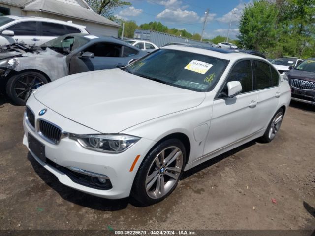 Photo 1 VIN: WBA8E1C50HK480300 - BMW 330E 