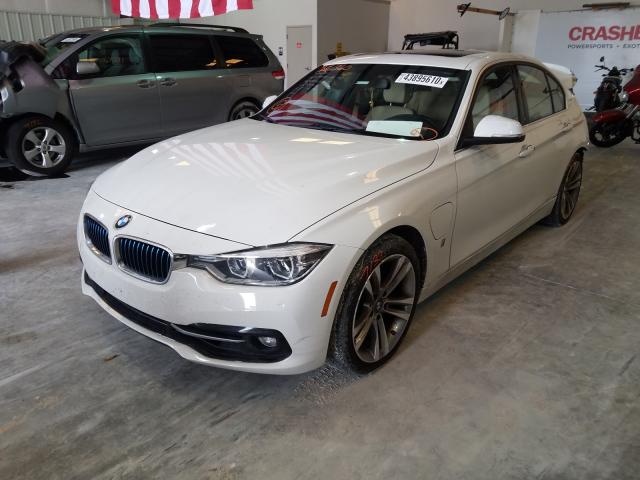 Photo 1 VIN: WBA8E1C52JA165591 - BMW 330E 