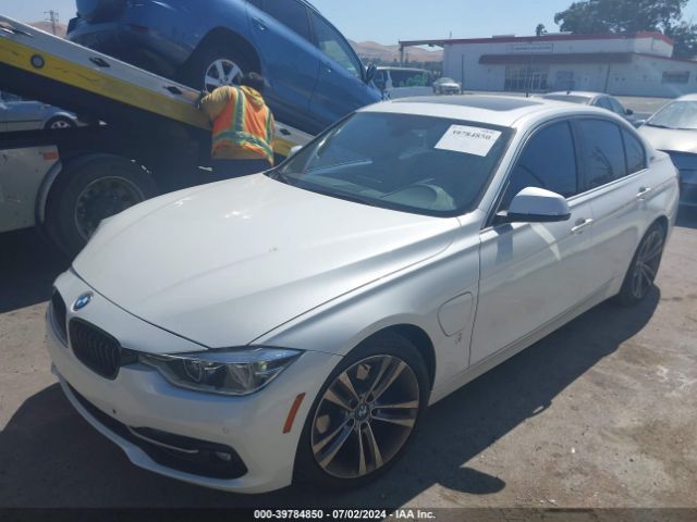 Photo 1 VIN: WBA8E1C52JA762918 - BMW 330E 