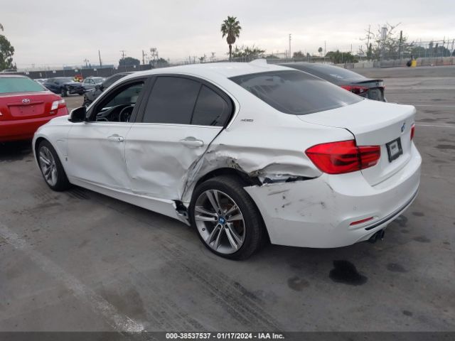 Photo 2 VIN: WBA8E1C53JA758702 - BMW 330E 