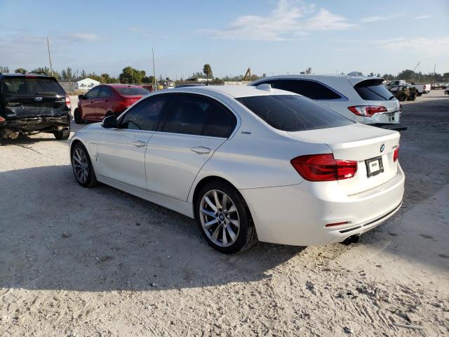 Photo 2 VIN: WBA8E1C57JA178563 - BMW 330E 