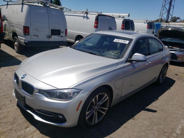 Photo 1 VIN: WBA8E1C59JA171436 - BMW 330E 