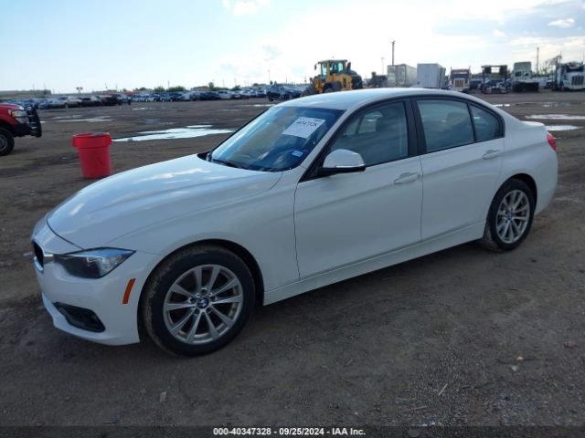 Photo 1 VIN: WBA8E1G3XHNU18068 - BMW 320I 