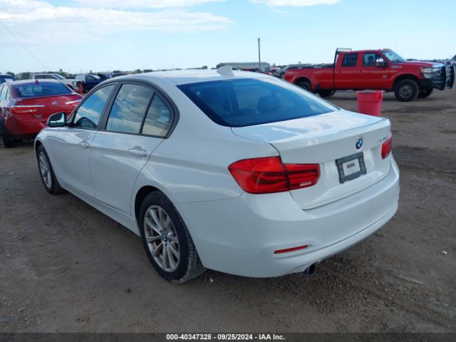 Photo 2 VIN: WBA8E1G3XHNU18068 - BMW 320I 