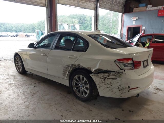 Photo 2 VIN: WBA8E1G51GNT38013 - BMW 320I 