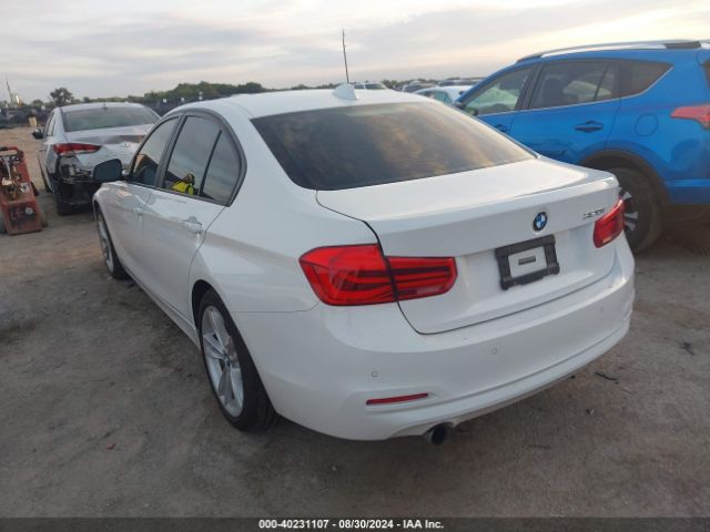 Photo 2 VIN: WBA8E1G57HNU12990 - BMW 320I 