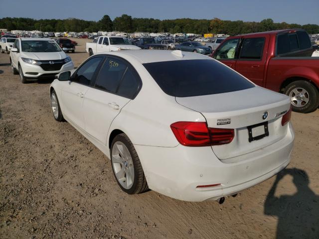 Photo 2 VIN: WBA8E1G5XGNT34445 - BMW 320I 