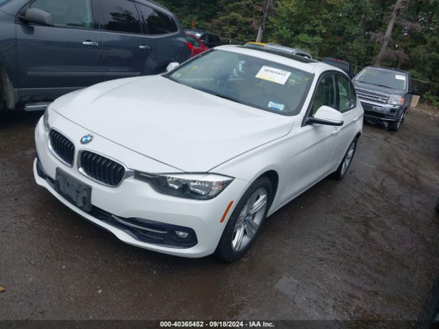 Photo 1 VIN: WBA8E3G56GNT74906 - BMW 328I 