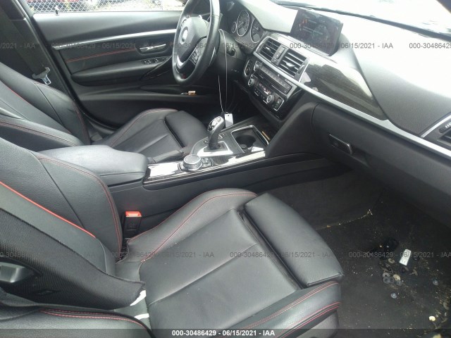 Photo 4 VIN: WBA8E3G5XGNT79929 - BMW 328XI 