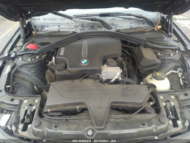 Photo 9 VIN: WBA8E3G5XGNT79929 - BMW 328XI 