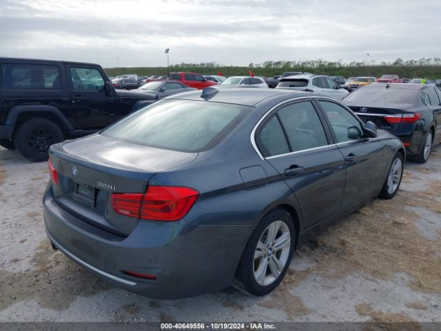 Photo 3 VIN: WBA8E3G5XGNU05106 - BMW 328I 