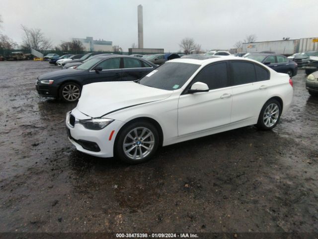 Photo 1 VIN: WBA8E5G31HNU43285 - BMW 320I 