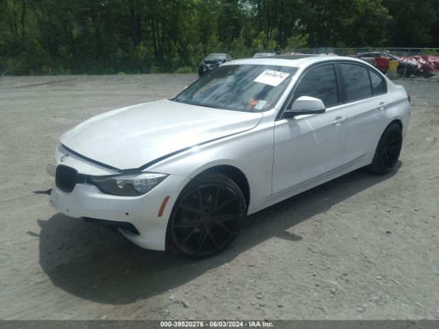 Photo 1 VIN: WBA8E5G54GNT40152 - BMW 320I 