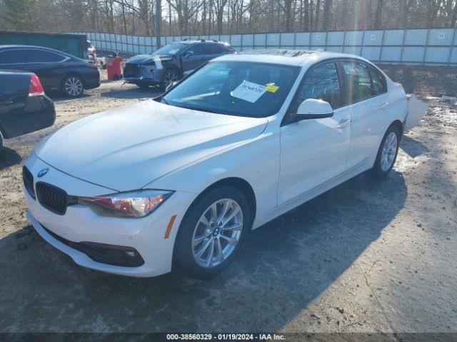 Photo 1 VIN: WBA8E5G57HNU41946 - BMW 320I 