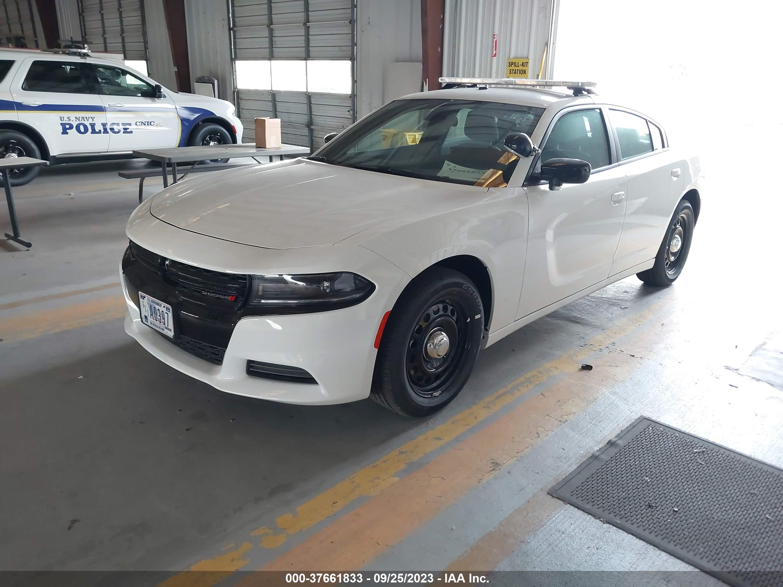 Photo 1 VIN: WBA8E9C56GK603904 - DODGE CHARGER 