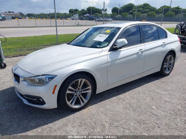 Photo 1 VIN: WBA8E9G50GNT45517 - BMW 328I 