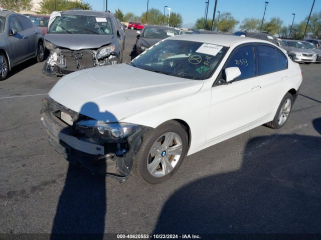 Photo 1 VIN: WBA8E9G52GNT84058 - BMW 328I 