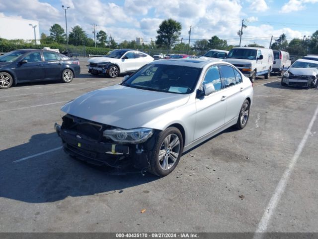 Photo 1 VIN: WBA8E9G52GNT87025 - BMW 328I 