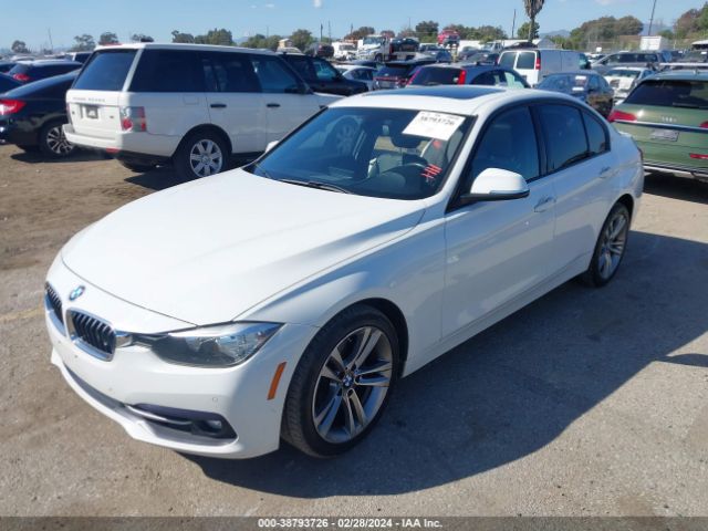 Photo 1 VIN: WBA8E9G53GNU29802 - BMW 328I 