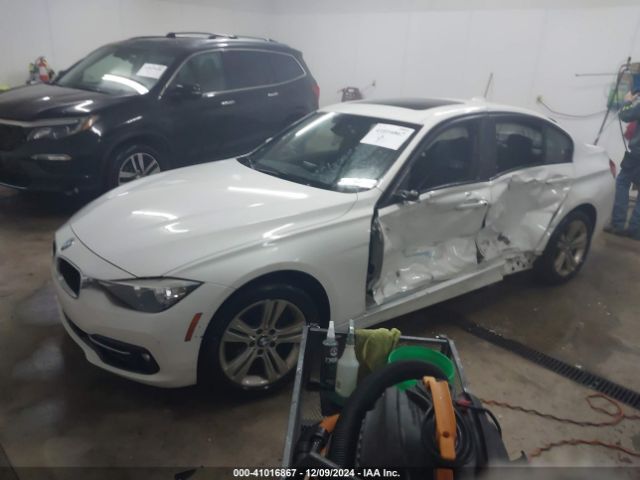 Photo 1 VIN: WBA8E9G56GNT83902 - BMW 328I 