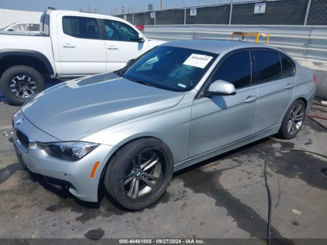 Photo 1 VIN: WBA8E9G57GNT83214 - BMW 328I 