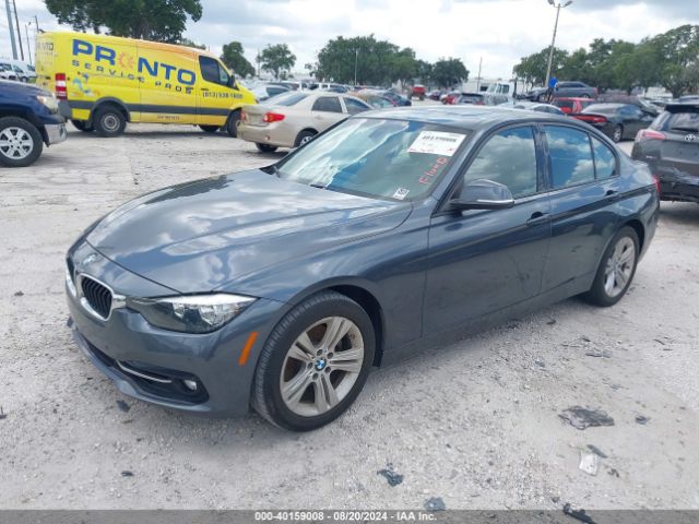 Photo 1 VIN: WBA8E9G57GNT83407 - BMW 328I 