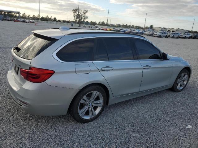 Photo 2 VIN: WBA8K3C5XJA369818 - BMW 330 XI 