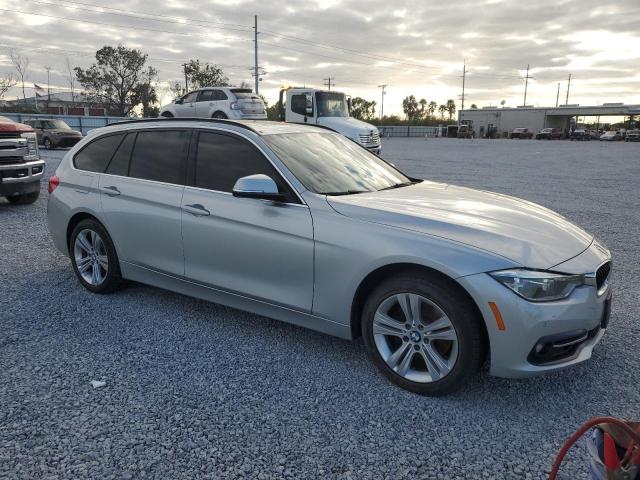 Photo 3 VIN: WBA8K3C5XJA369818 - BMW 330 XI 