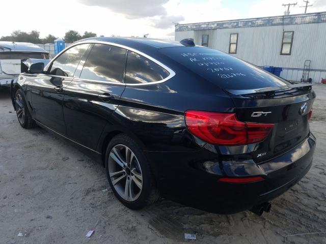 Photo 2 VIN: WBA8Z9C30HG826706 - BMW 330XI 