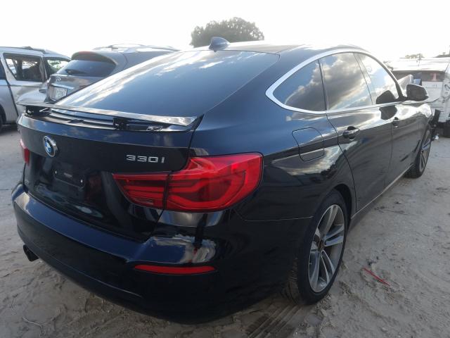 Photo 3 VIN: WBA8Z9C30HG826706 - BMW 330XI 