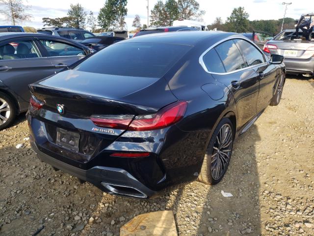 Photo 3 VIN: WBAGV8C09LCE21681 - BMW M850XI 