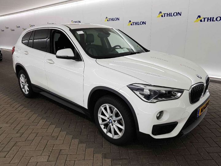 Photo 2 VIN: WBAHS710305H09657 - BMW X1 