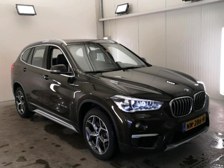 Photo 11 VIN: WBAHS710705H09919 - BMW X1 